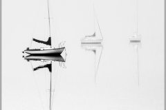 Mannie-Green-Sailboats-in-Fog-Nov-2025-Digital-Mono-Reflections-Salon-Medal